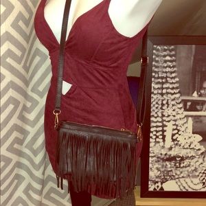 Small black crossbody bag with fringe
